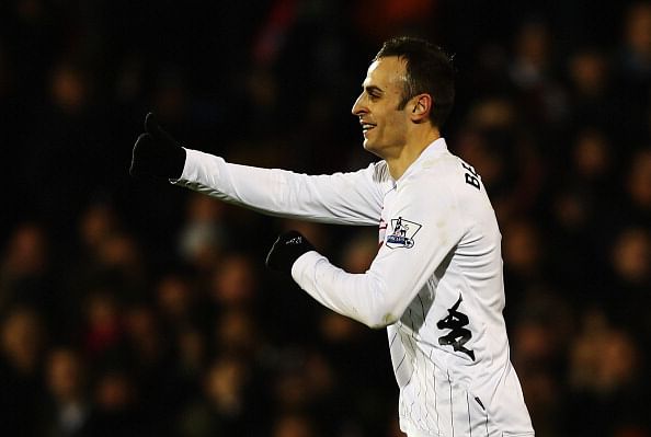 Dimitar Berbatov of Fulham celebrates scoring his sides second goal during the Barclays Premier League match between Fulham and Queens Park Rangers at Craven Cottage on April 1, 2013 in London, England. (Photo by Clive Rose/Getty Images)